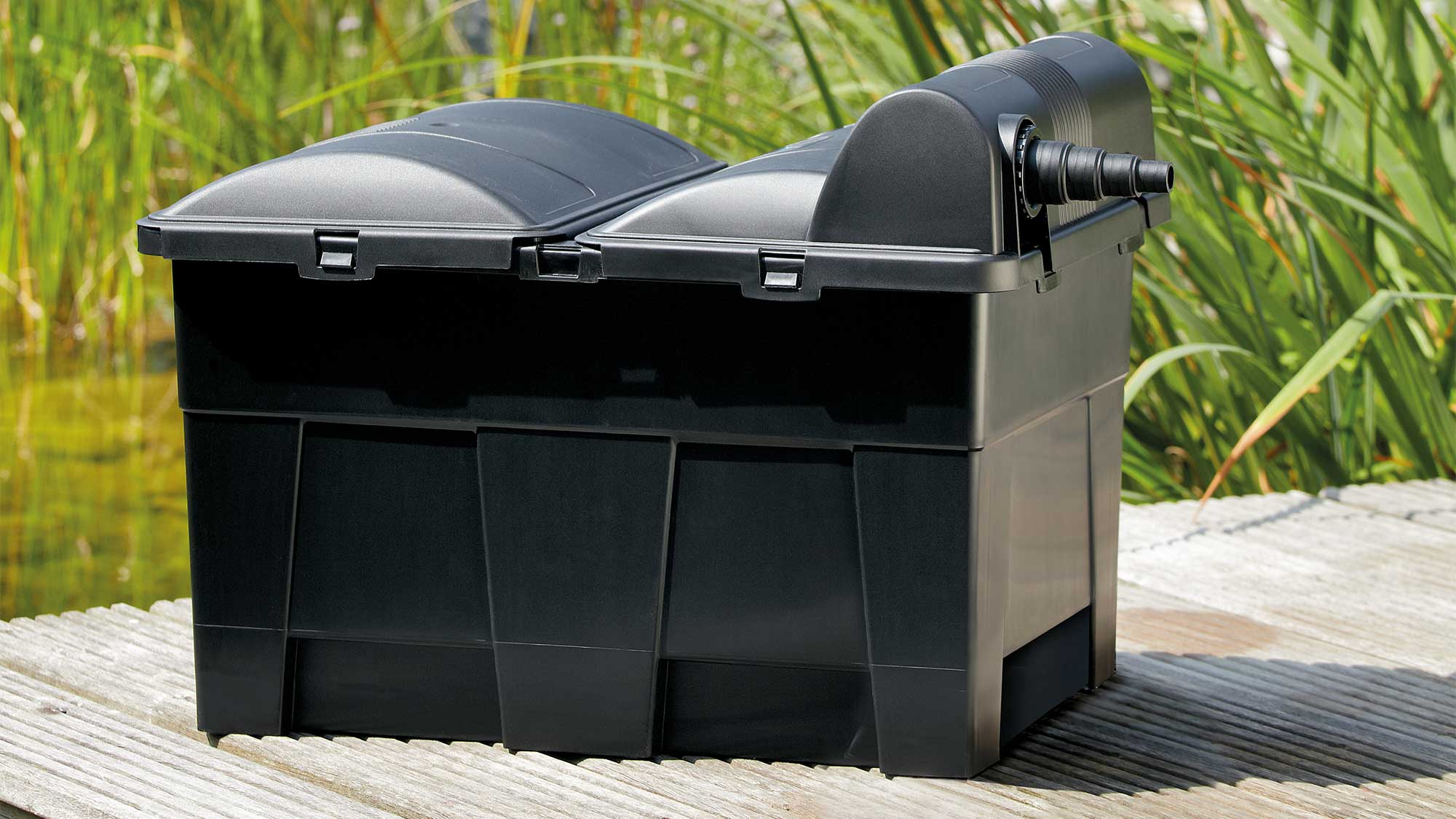 OASE105560-BioSmartUVC16000 The Oase BioSmart 16000 UVC through-flow filter has special foam media to break down pond waste and an integrated 11W UV for clear water.