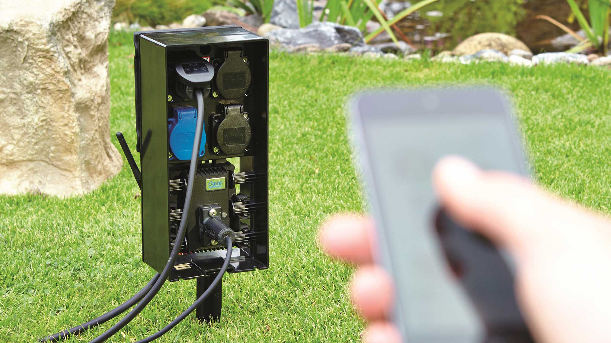 OASE106160-FM-Master-WLAN The InScenio FM Master EGC Garden Controller is a WiFi remote garden control system and power supply in one.